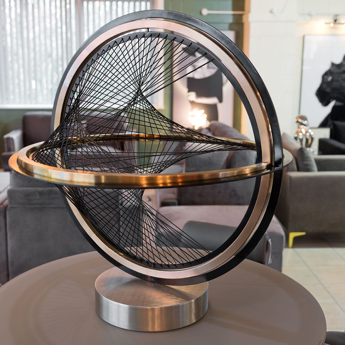 Decorative Orb Sculpture on display in our Showroom