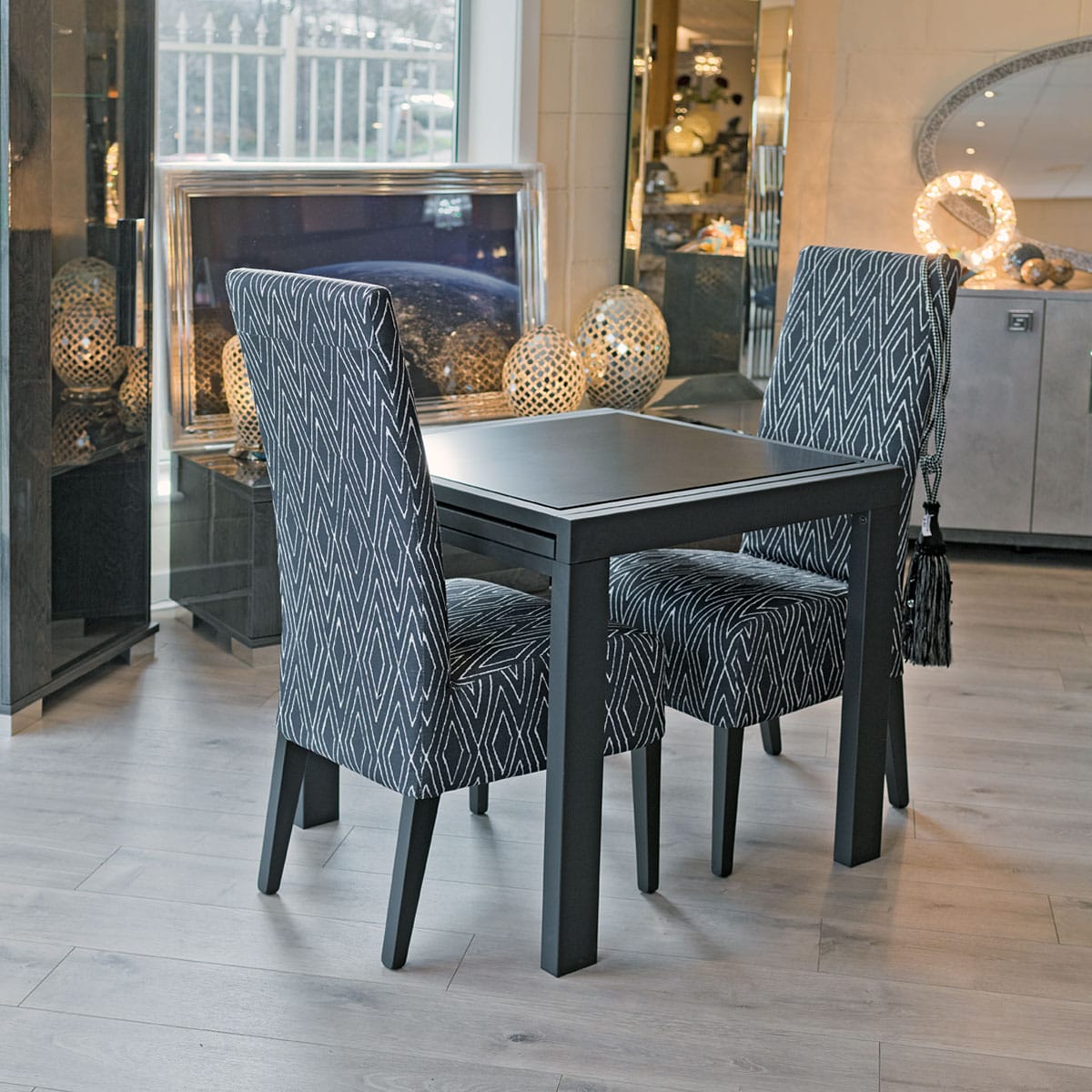 Frosted Black Glass Extending Dining Table - on display in our showroom - before extension