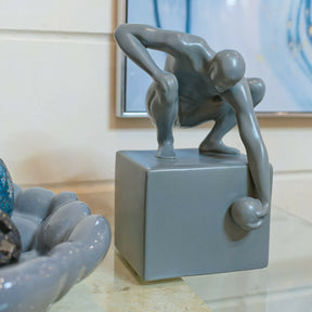 World in his Hand Ceramic Sculpture – Sculpture by Febland