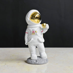 Coffee on the Moon Astronaut Figurine – Sculpture by Febland