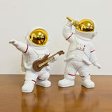 Astronaut Playing Guitar and Astronaut Singing in our Showroom