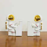 Astronaut Playing Piano Book Ends on Display