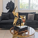 Gold Polygon Sculpture on display in our Showroom