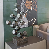 Rhombic Dodecahedron Tower Sculpture on display in our Showroom