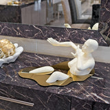 Liquid Embrace Cream Resin Sculpture on Display