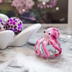Glass Pink Octopus Bubble Paperweight in our Showroom