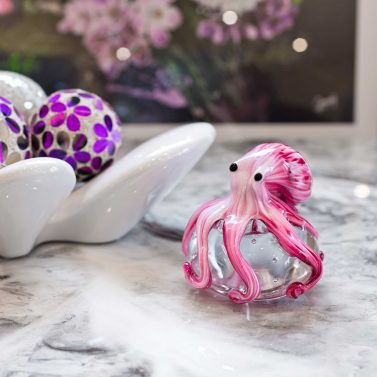 Glass Pink Octopus Bubble Paperweight in our Showroom